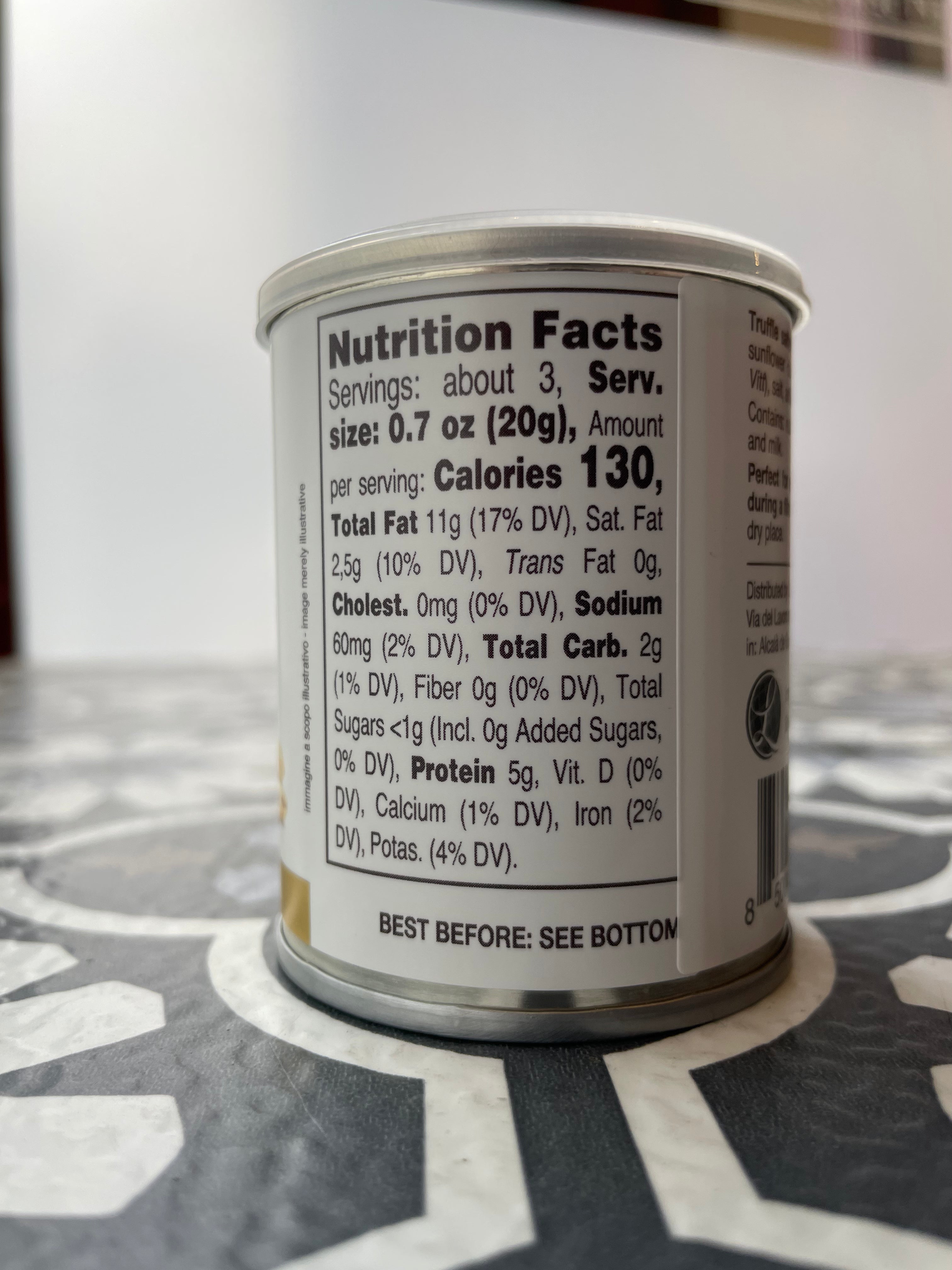 small metal can of truffle peanuts, nutrition facts