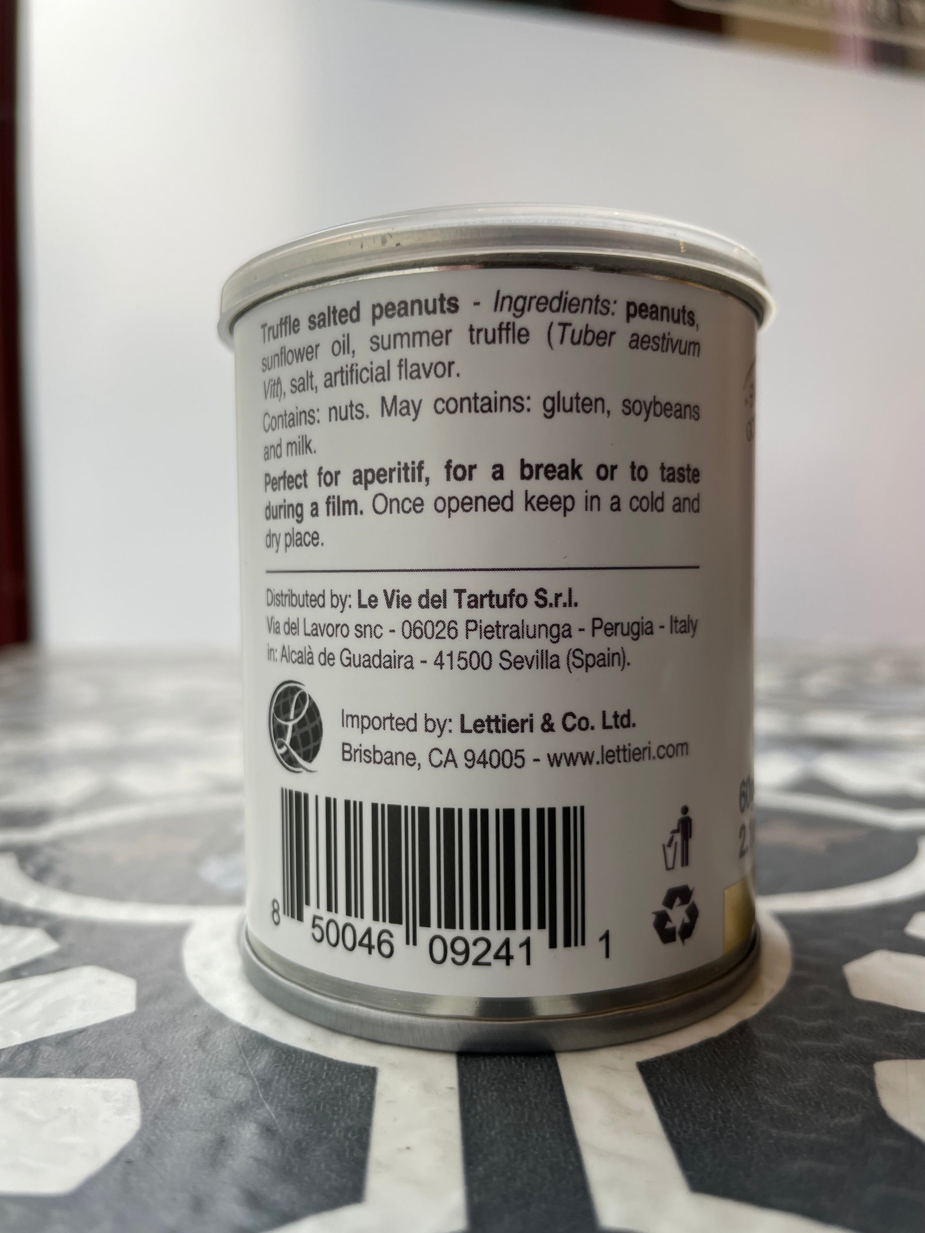 small metal can of peanuts, "about the producer"