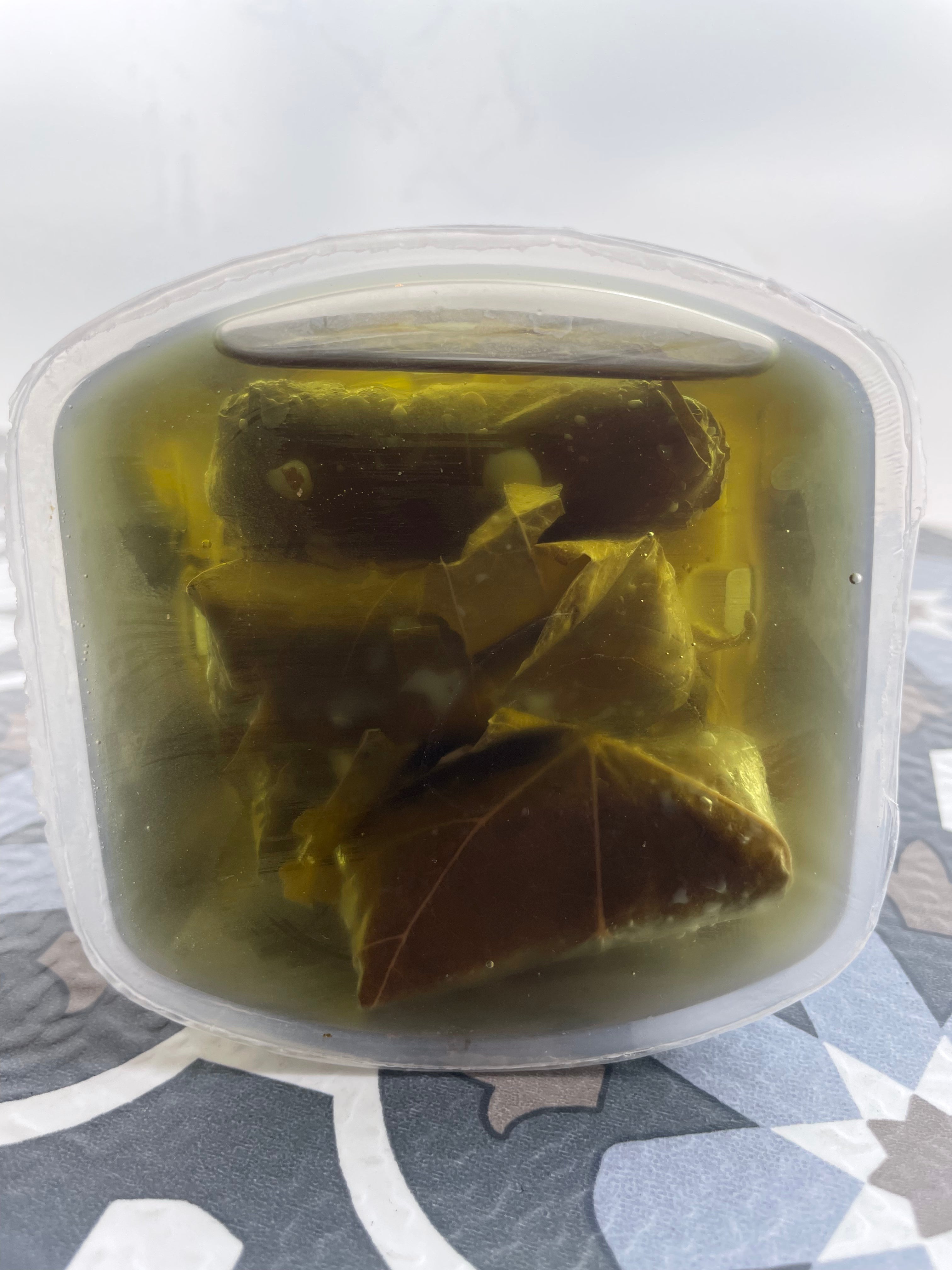 dolmas in olive oil front side - unobscured 