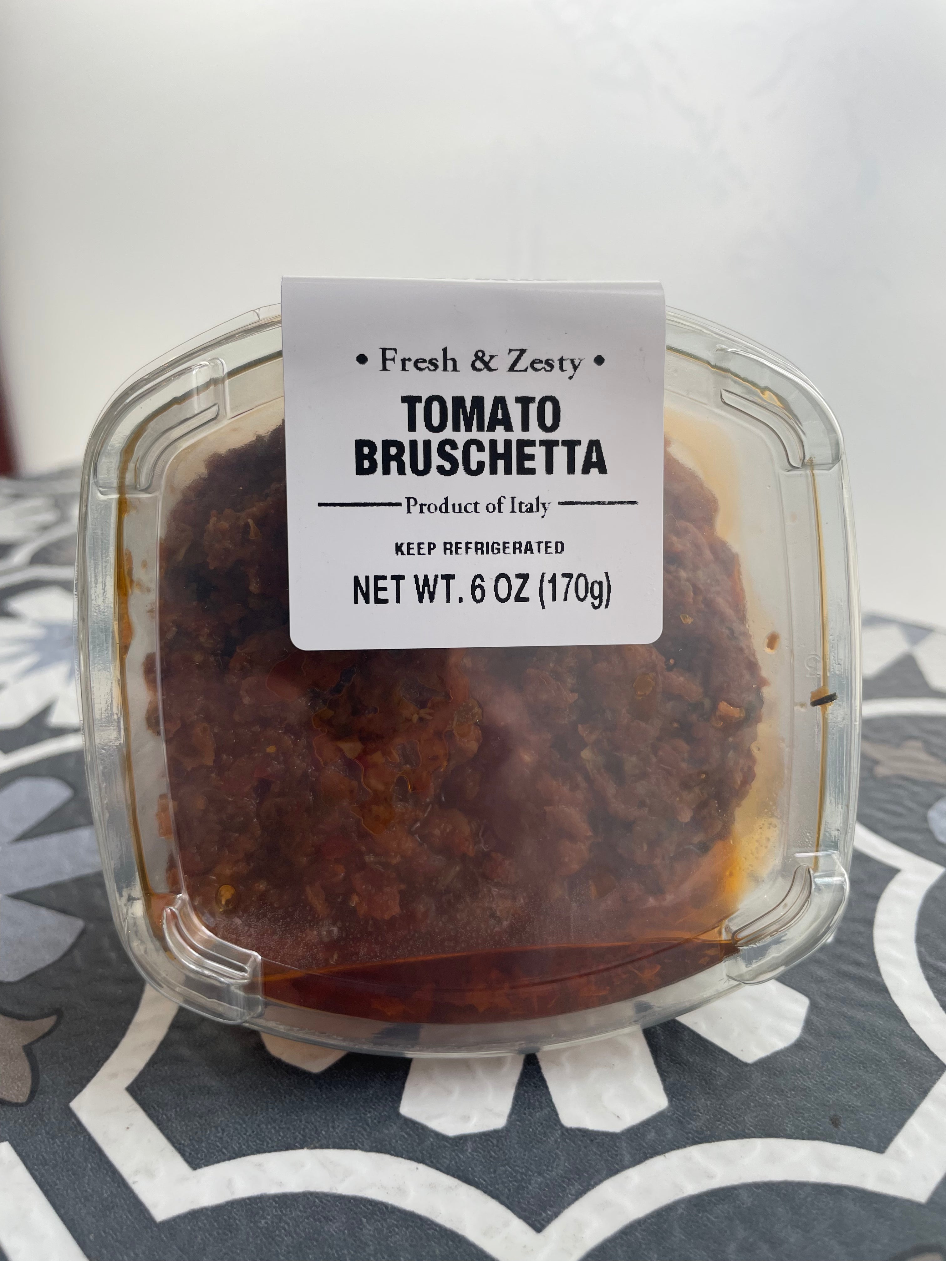 tomato bruschetta in plastic container