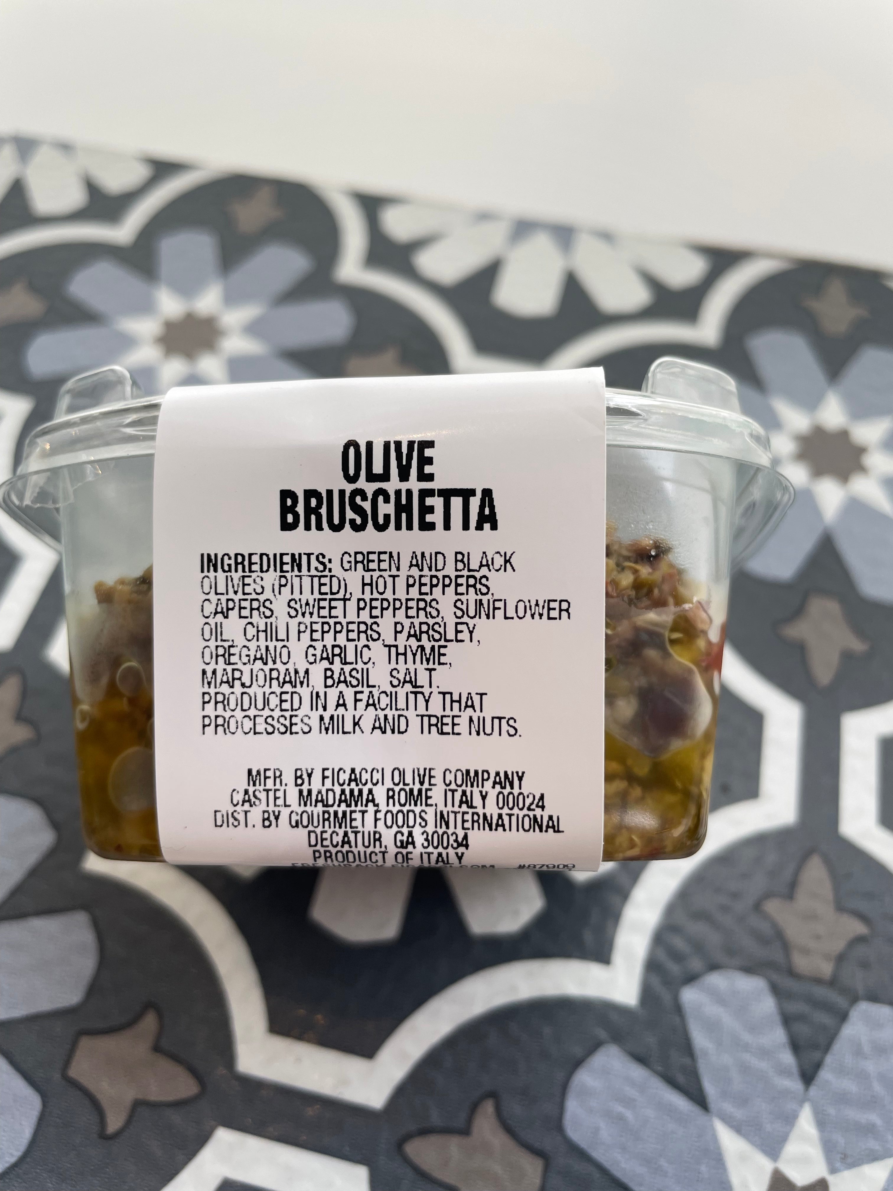 olive bruschetta in plastic container, ingredients