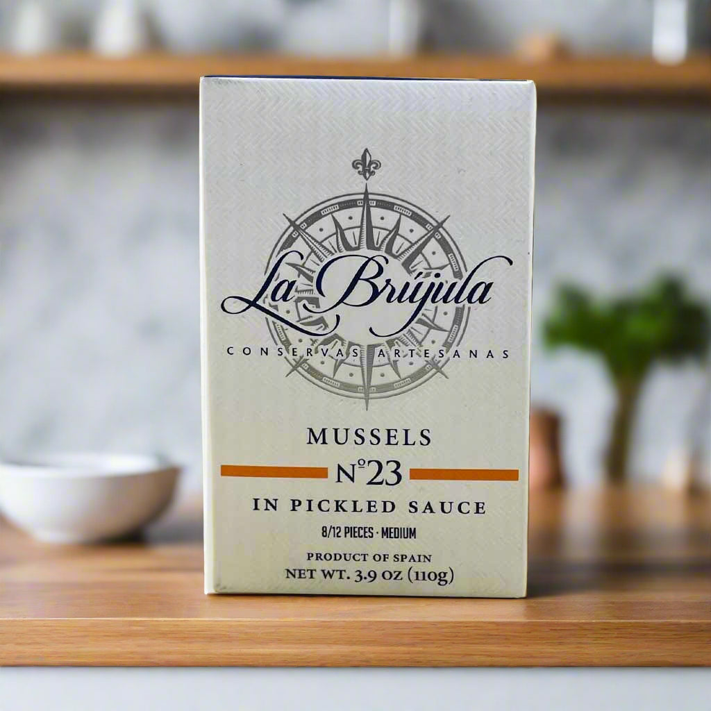 Retail package of mussels in pickled sauce, inside a kitchen
