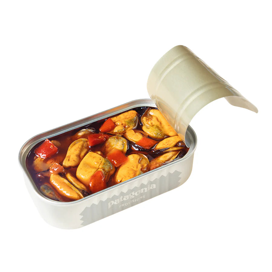 Patagonia Provisions open can of spicy mussels, with peppers and sauce, on white background