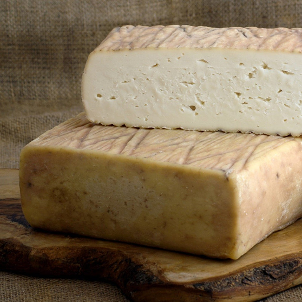 Photo of Quadrello di Bufula, a soft washed rind buffalo milk cheese. 