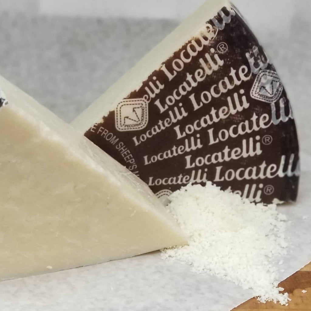 wedge of hard pale cheese with brown label