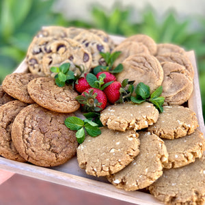 wooden tray of cookie with strawberries