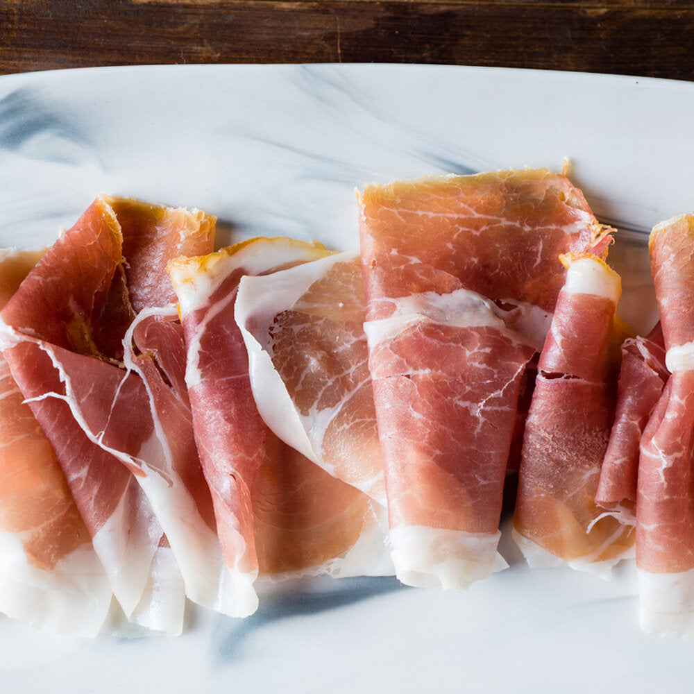 prosciutto slices folded over ontop of each other