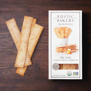 box of rustic bakery crackers with crackers on side