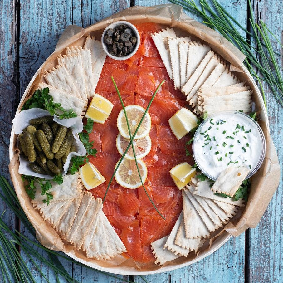 Platter with smoked salmon, crackers, cr�me fraiche, capers, and pickles