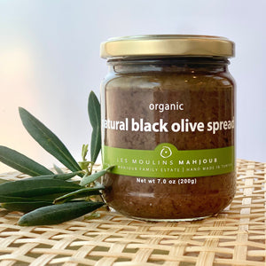small jar of black olive spread
