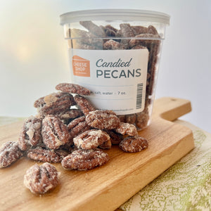 plastic container of candied pecans