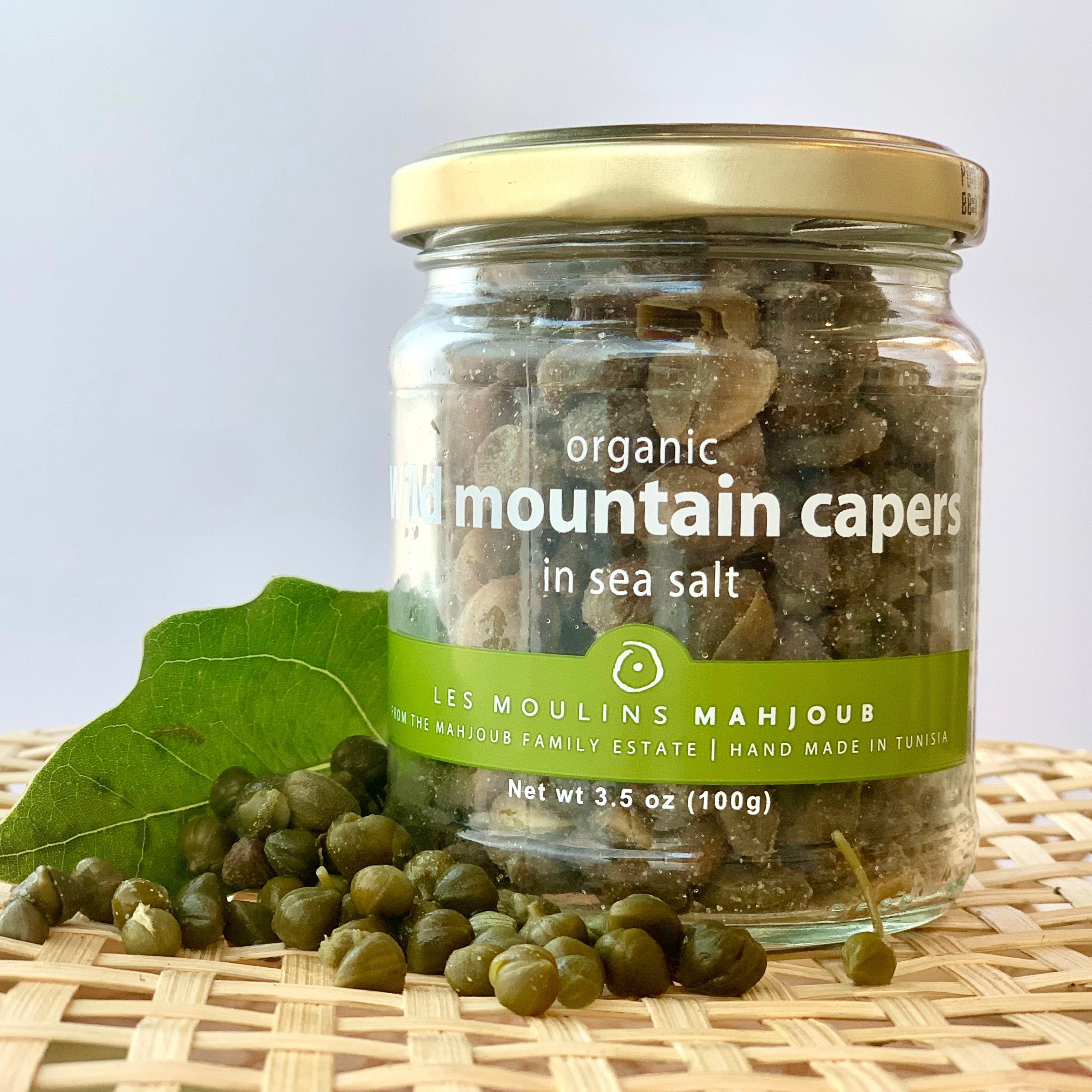 small glass jar of salted capers