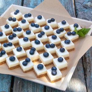 small cheesecake squares with blueberries