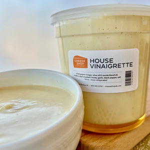 container and bowl of house vinaigrette