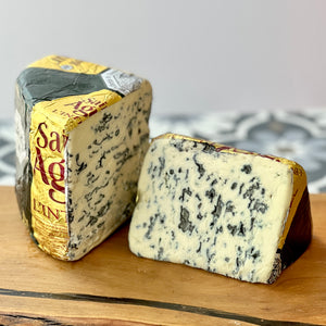 foiled quarter wheel and wedge of st agur cheese