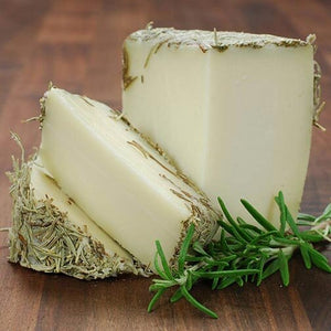Soft cheese covered with a layer of dried rosemary